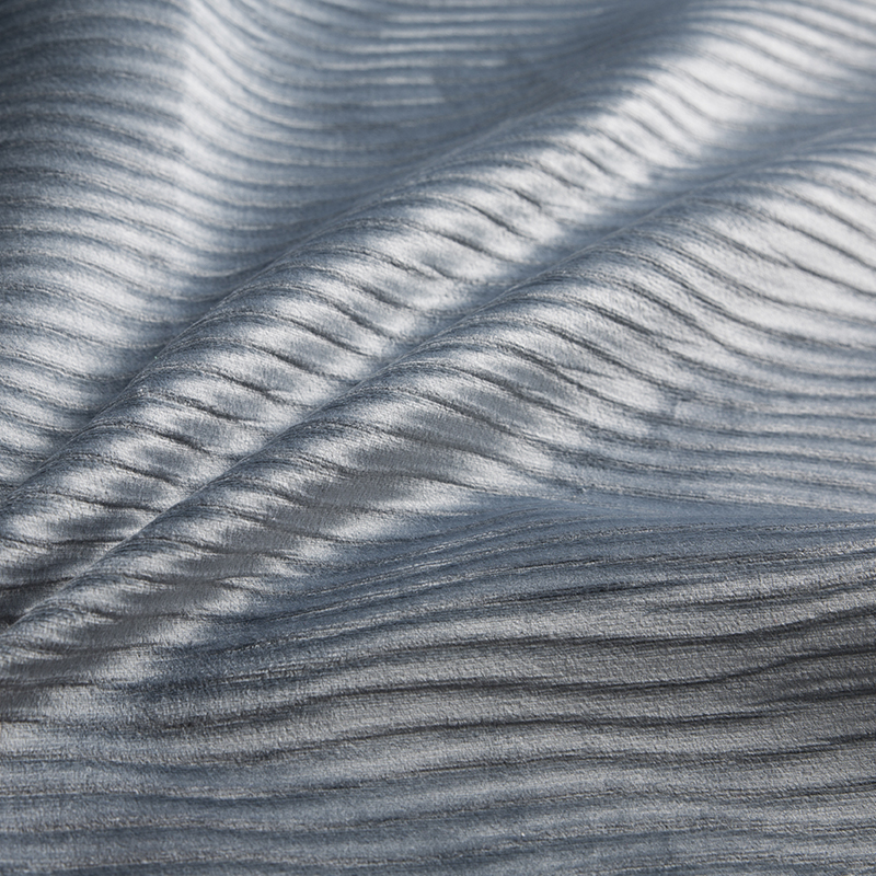 Un Wrap Knitting Fabric este o structură textilă constând din bucle realizate din fire multiple